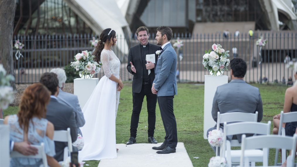 A scene from B&B showing Steffy and Liam at the altar with Opera House in the background