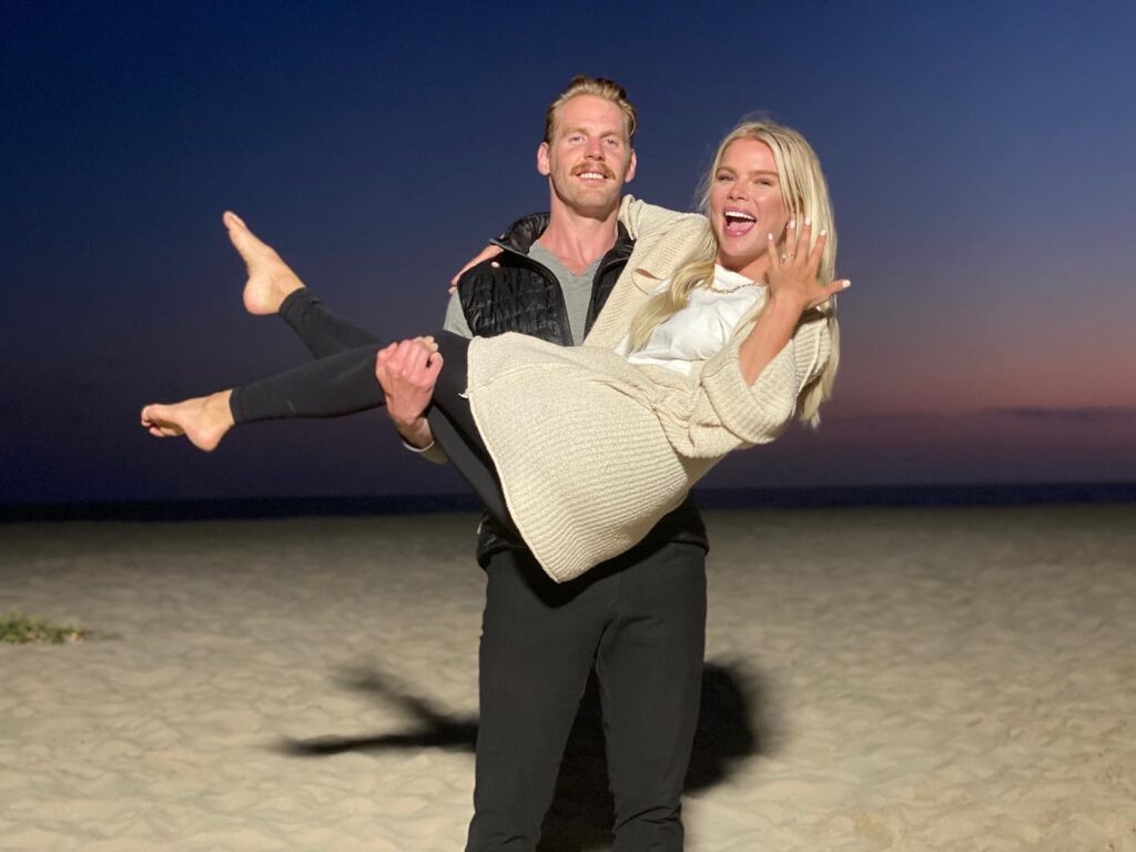 justin wilmers carrying Kelli Goss flaunting her engagement ring