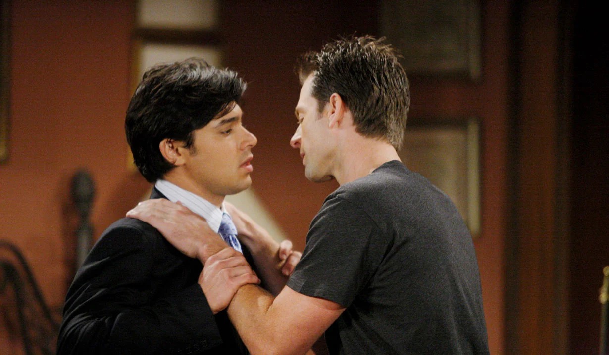 Gay Adam Newman and Rafe Torres about to kiss