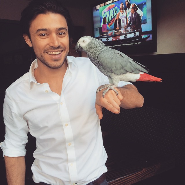 Yani Gellman with a bird on his hand