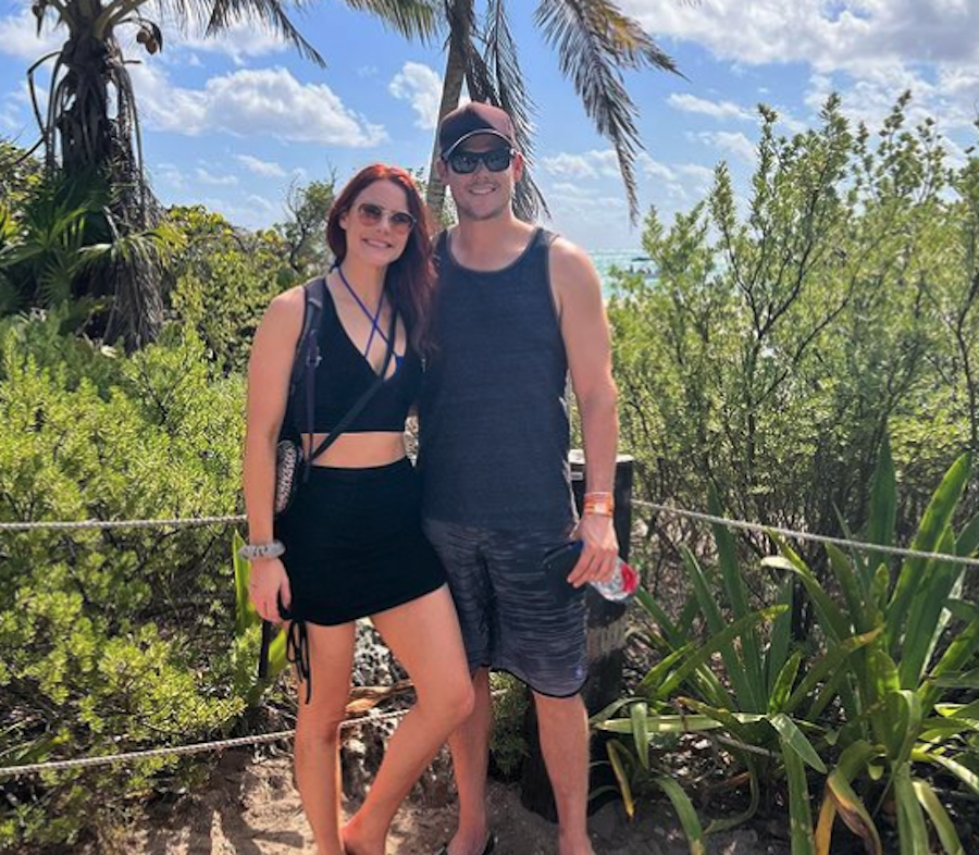 Mark Grossman and Courtney Hope posing for a picture while in Tulum, Mexico for a vacation.