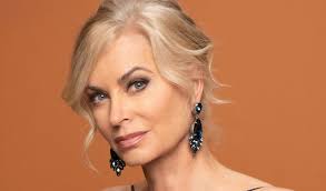 Eileen Davidson gazing into the camera while she slays in the black earring.