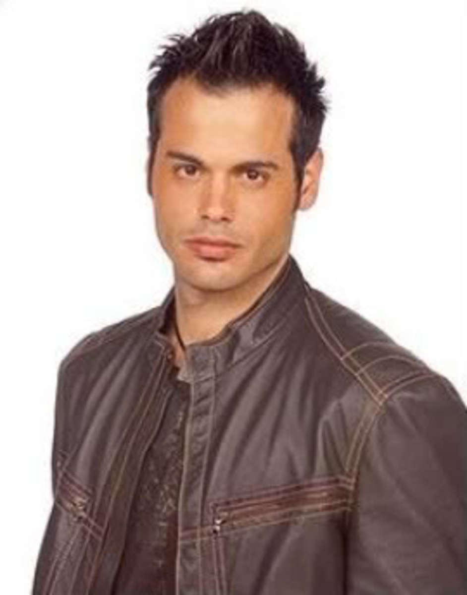 Stephen Martines wearing brown leather jacket. 