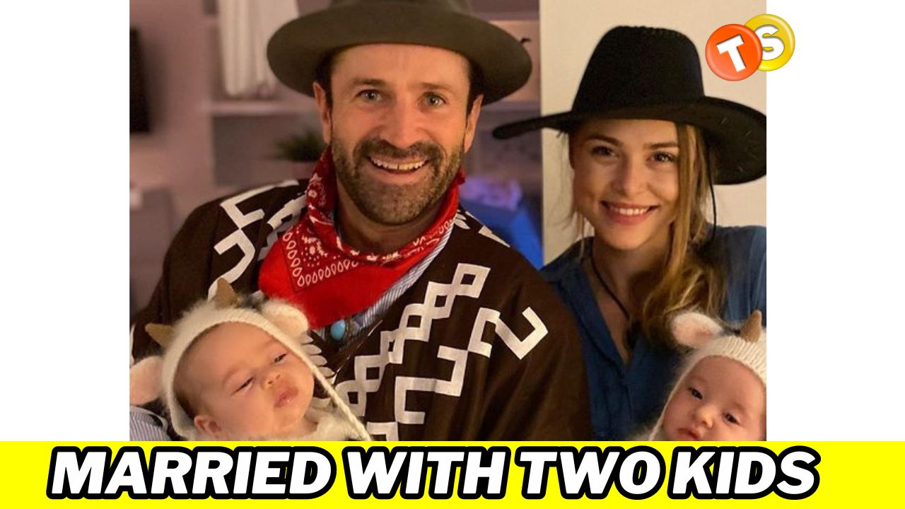 Hayley Erin and Adam Fergus in cowboy costumes with kids